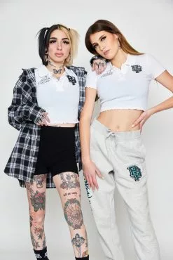 BROKEN PROMISES Poor Sport Cropped Polo Top Womens