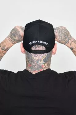 BROKEN PROMISES Headwear Crossbones Snapback