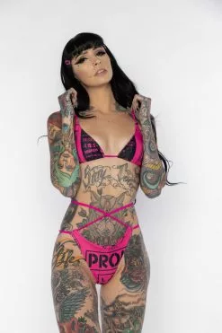 BROKEN PROMISES Switchblade Bikini Top Swim